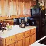 Custom Cabinets With Mirror Backsplash