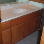 Red Oak Vanity With Honey Stain Raised Panel Doors